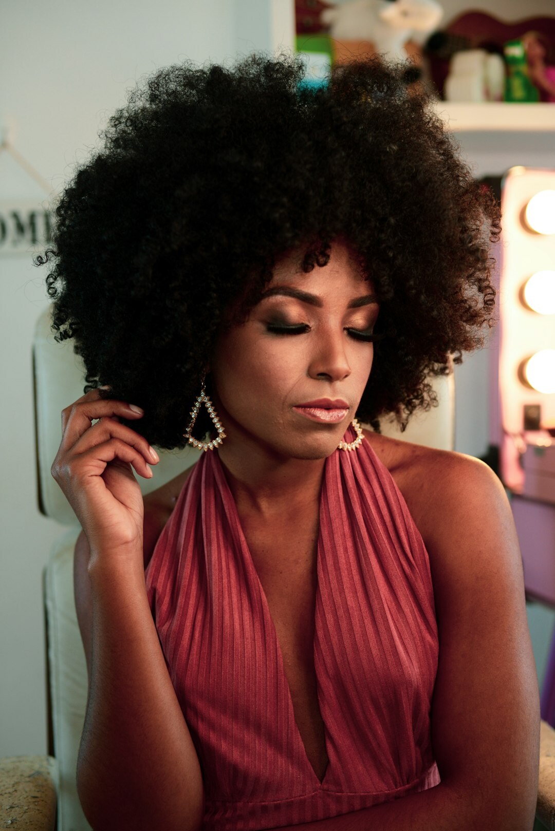 Portrait of a brazilian woman with curly afro hair smiling