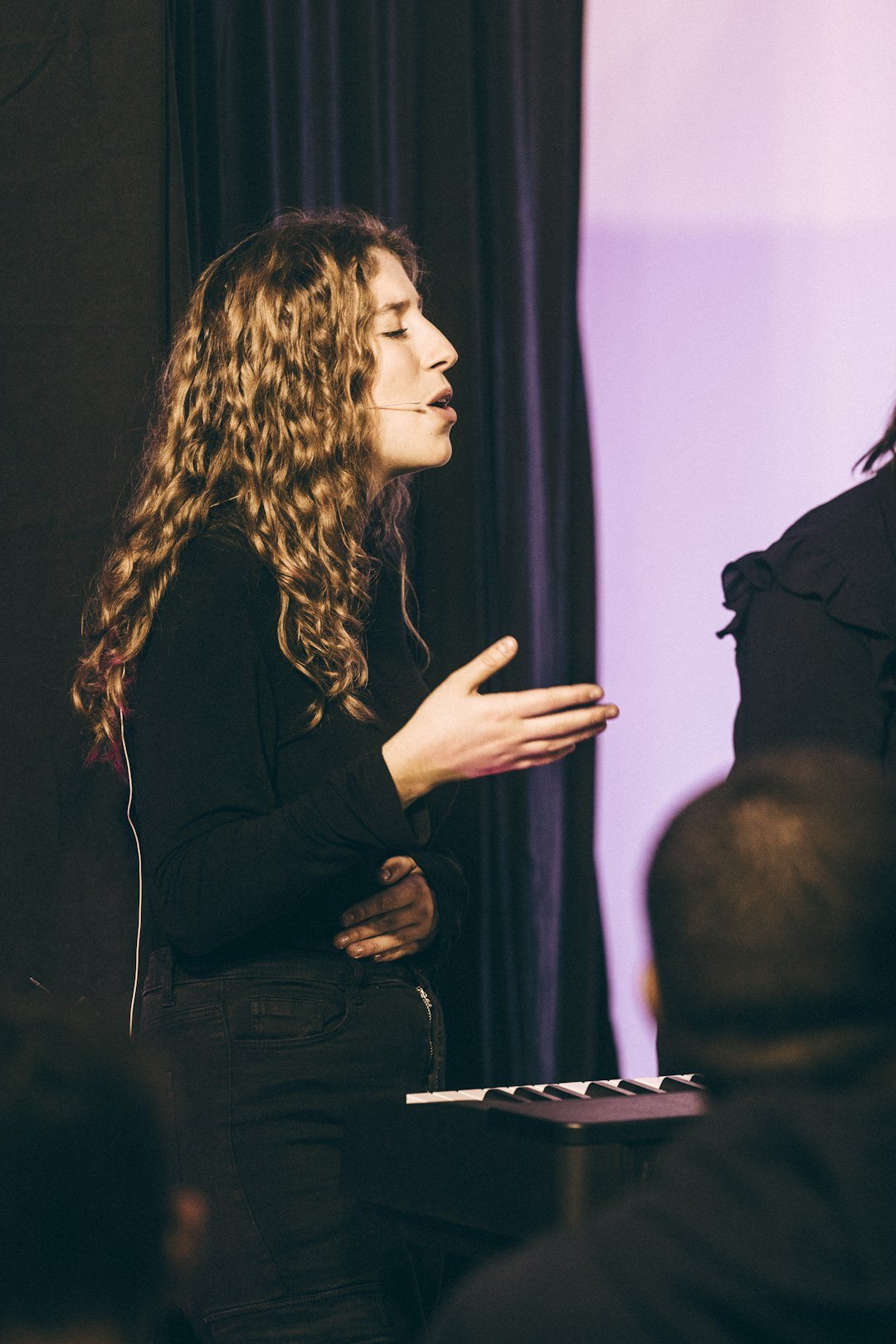 confident person speaking to audience