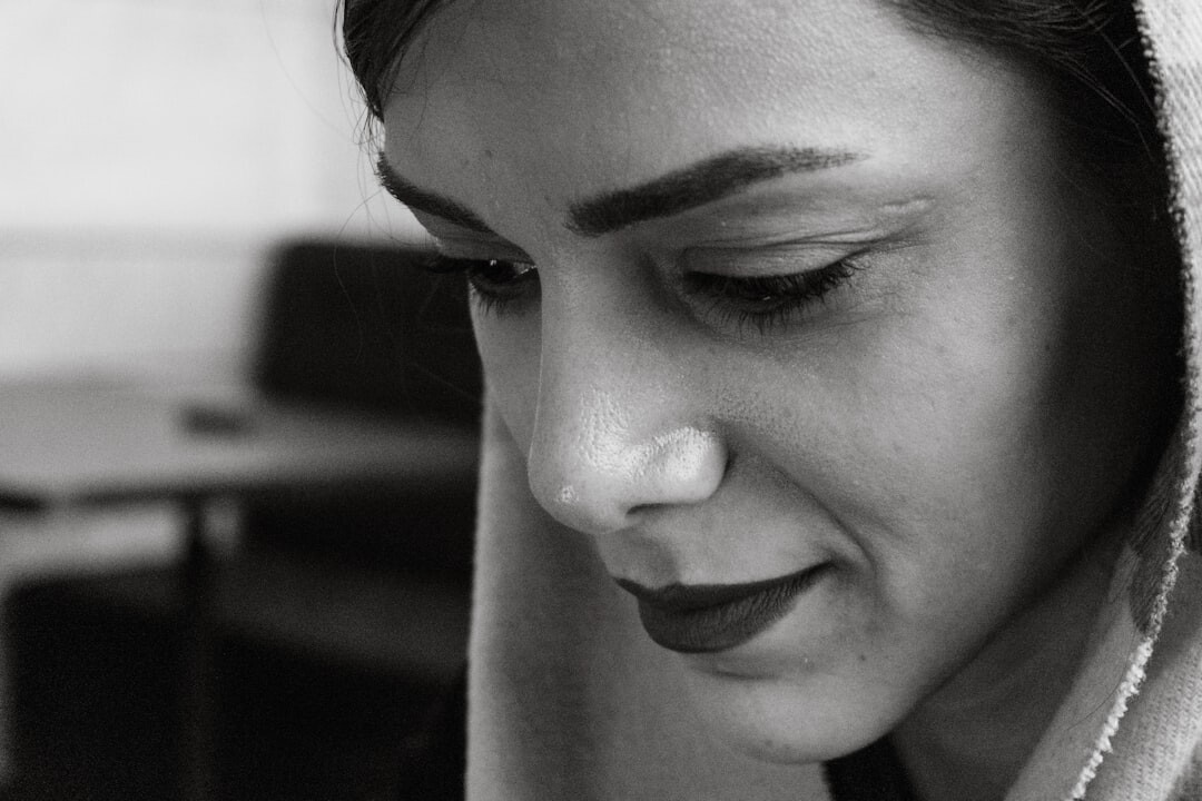 person reflecting in quiet moment