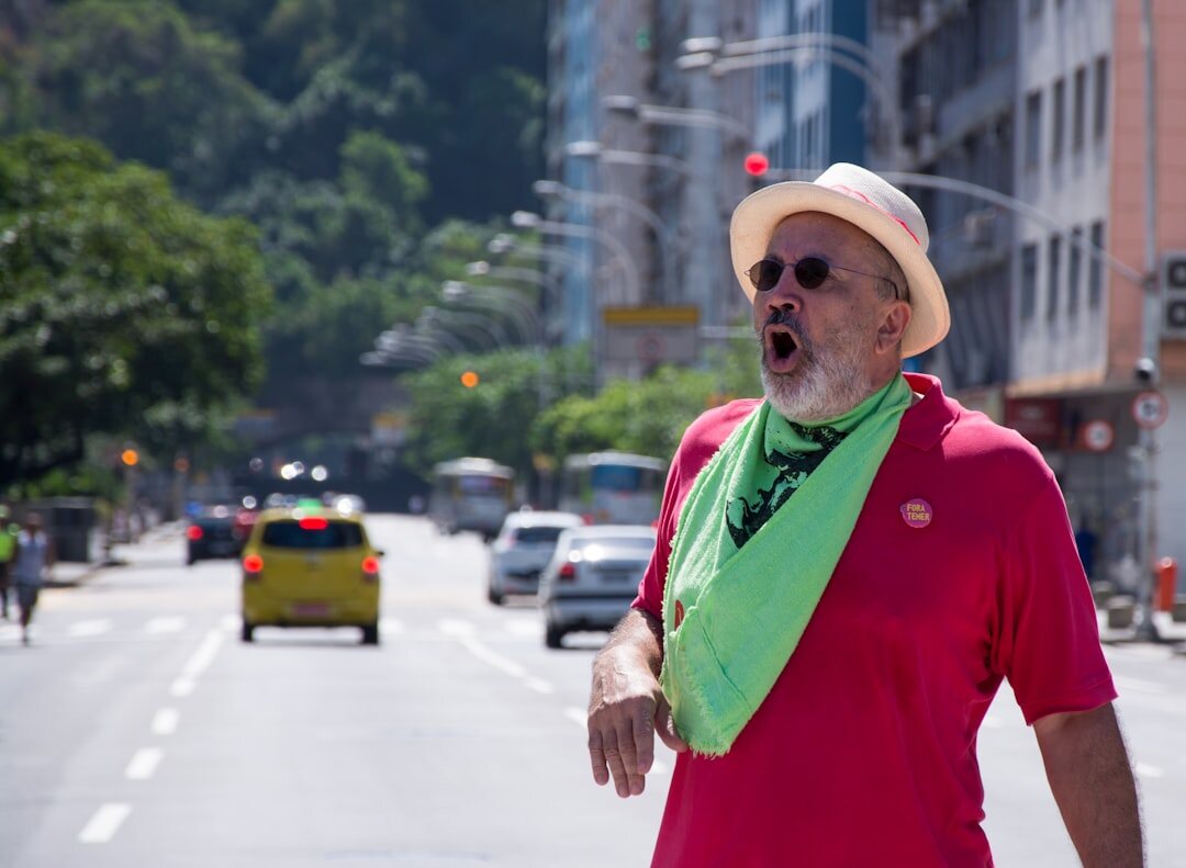 Portrait of an older brazilian man with glasses and beard